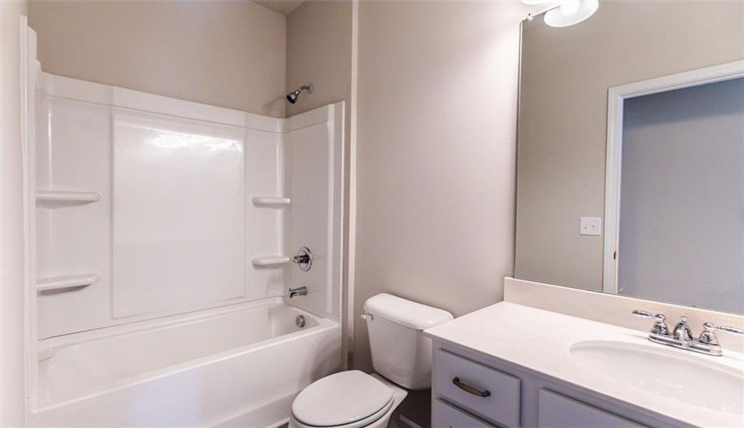 Furnished interior view inside a new home in Summerfield Place, Carrollton (Image 3).
