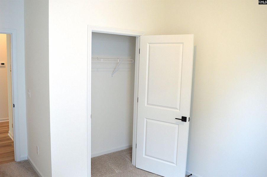 Spacious, unfurnished interior of a new home in Bickley Station, Irmo (Image 27).
