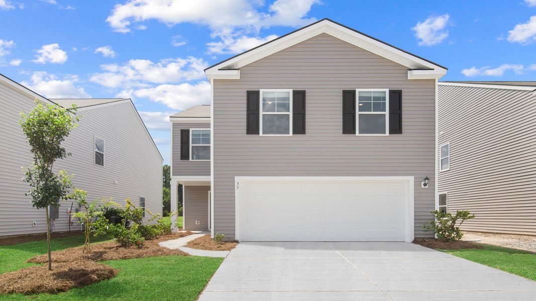 Representative exterior photo of a completed home built from the AISLE by D.R. Horton in Rice Hope, Port Wentworth, GA (Image 1).