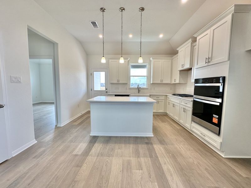 Furnished interior view inside a new home in Crosswinds, Kyle (Image 4).