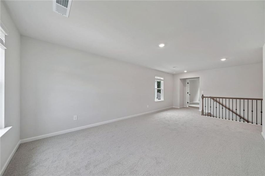 Spacious, unfurnished interior of a new home in Vines at Mill Creek - Estate Series, Braselton (Image 35).