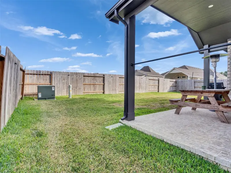 Exterior details and patio area of a home in Cherrywood Estates, Tomball (Image 4).