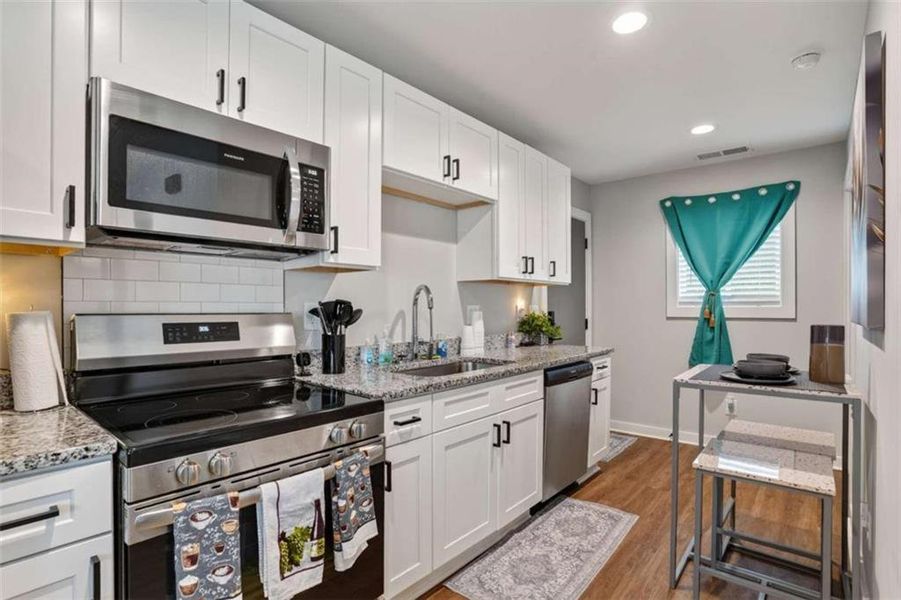 Furnished interior view inside a new home in , Atlanta (Image 8).
