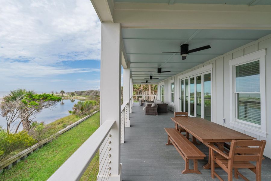 Exterior details and patio area of a home in , Edisto Island (Image 30).