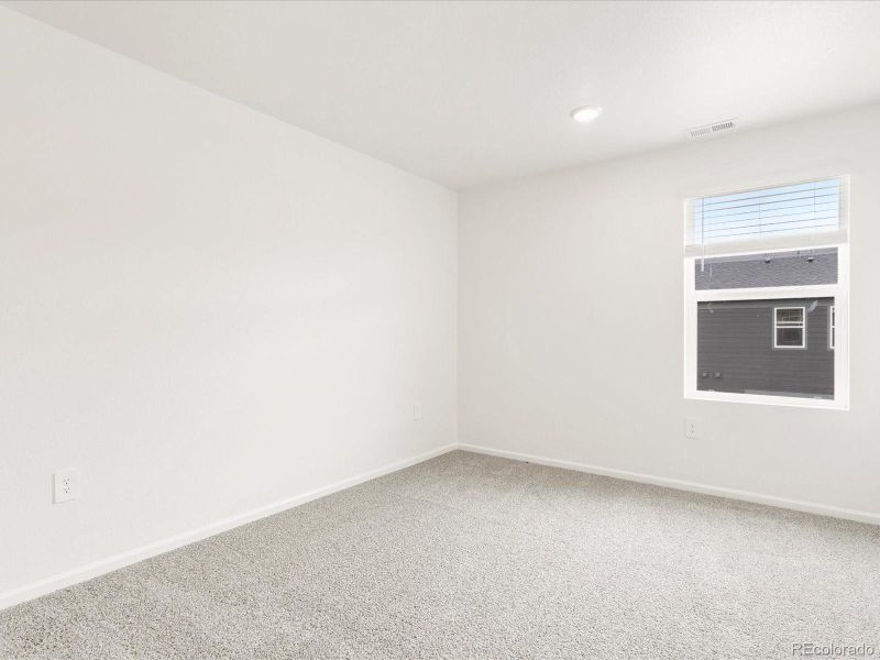 Spacious, unfurnished interior of a new home in Poudre Heights: The Meadow Collection, Windsor (Image 26).