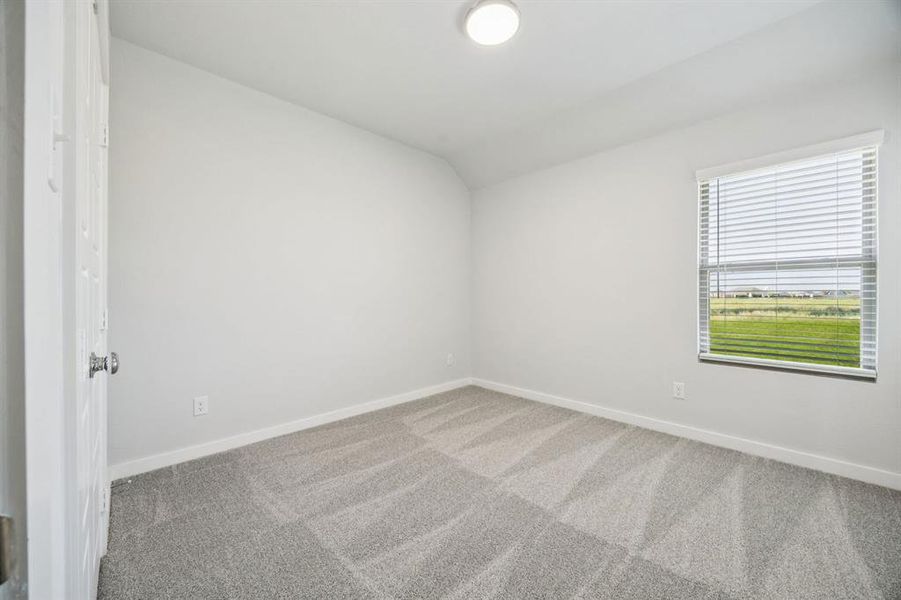 Bedroom in the Masters home plan by Trophy Signature Homes – REPRESENTATIVE PHOTO