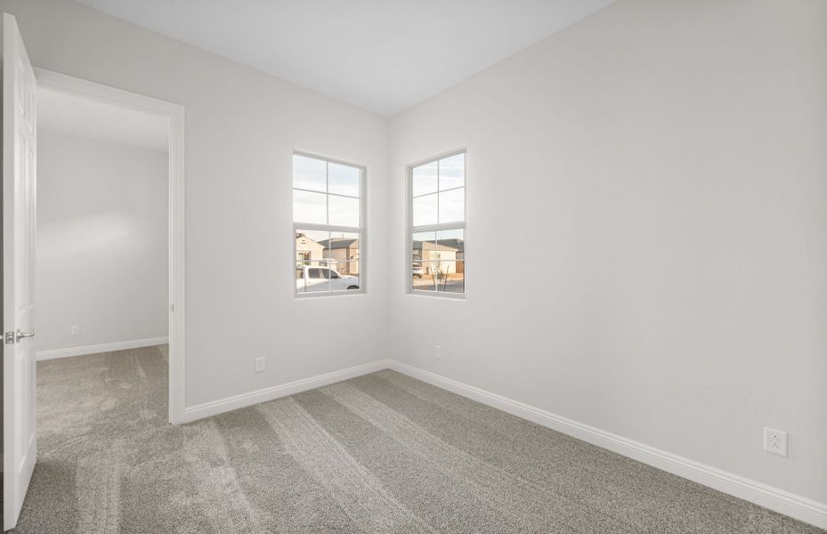 Spacious, unfurnished interior of a new home in Artisan at Asante, Surprise (Image 30).