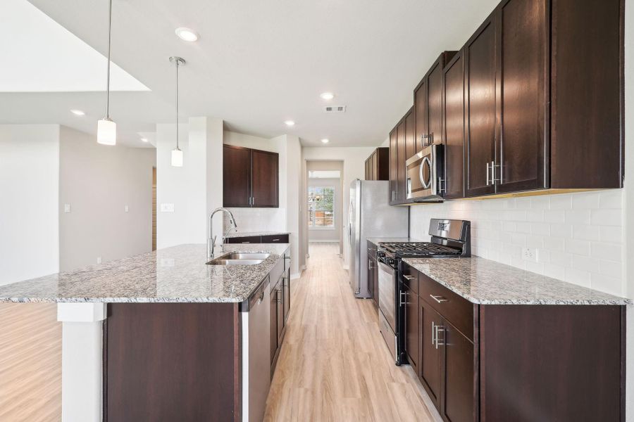 Photo is not of the actual home, but is an inspirational photo of builder’s model home and may depict options, furnishings, and/or decorator features that are not included