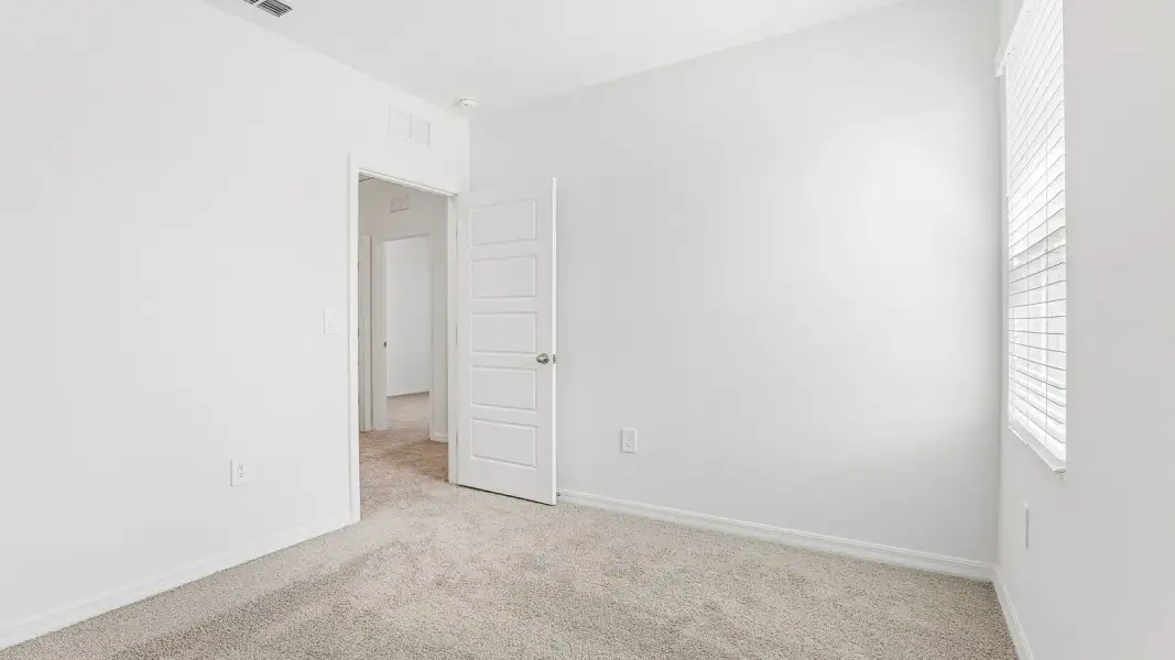 Representative unfurnished interior of a home built from the Crestview by D.R. Horton in Crosswinds, Haines City (Image 30).