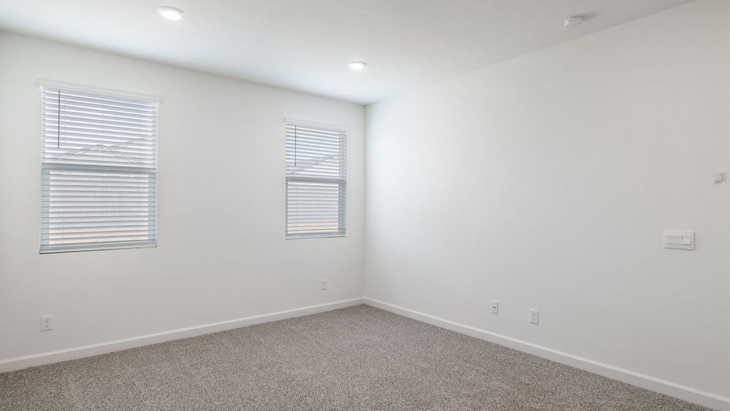 Spacious, unfurnished interior of a new home in Zanjero Pass, Waddell (Image 19).