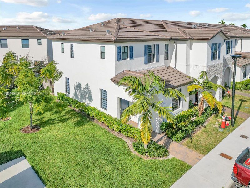 Front exterior of a new home in , Homestead, FL, highlighting curb appeal (Image 21).