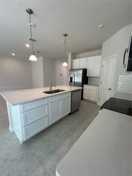 Furnished interior view inside a new home in Brooks Landing, Titusville (Image 6).