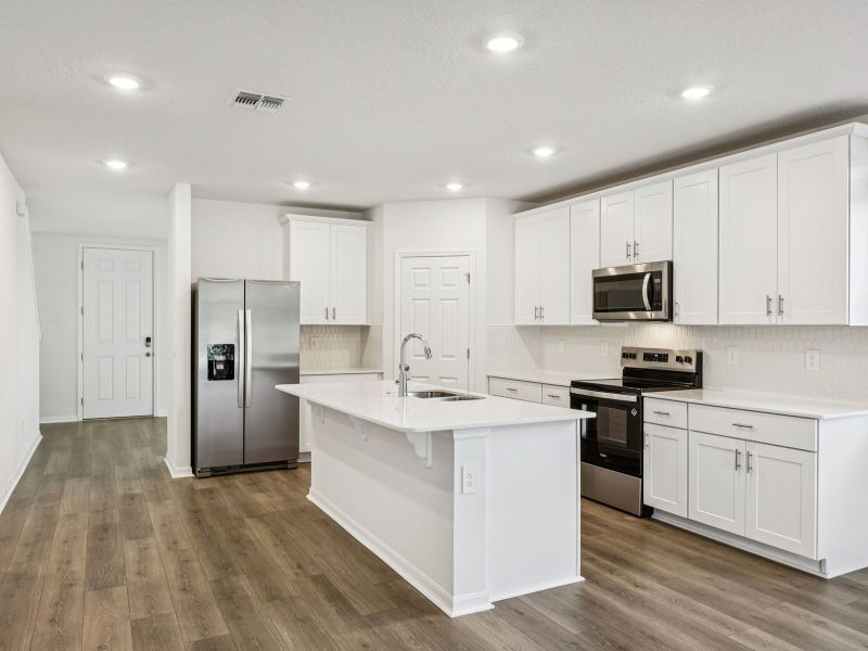 Furnished interior view inside a new home in The Meadow at Crossprairie, St. Cloud (Image 5).