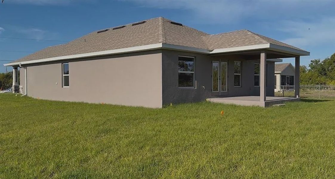 Exterior details and patio area of a home in Gulf Cove, Port Charlotte (Image 3). Exterior details and patio area of a home in Gulf Cove, Port Charlotte (Image 3).