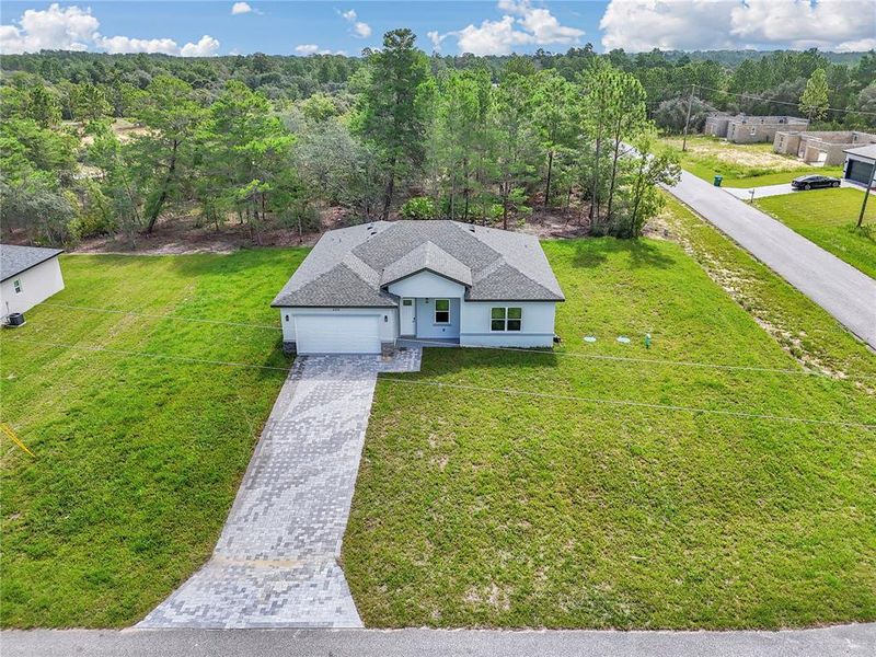 Front exterior of a new home in , Citrus Springs, FL, highlighting curb appeal (Image 1). Front exterior of a new home in , Citrus Springs, FL, highlighting curb appeal (Image 1).