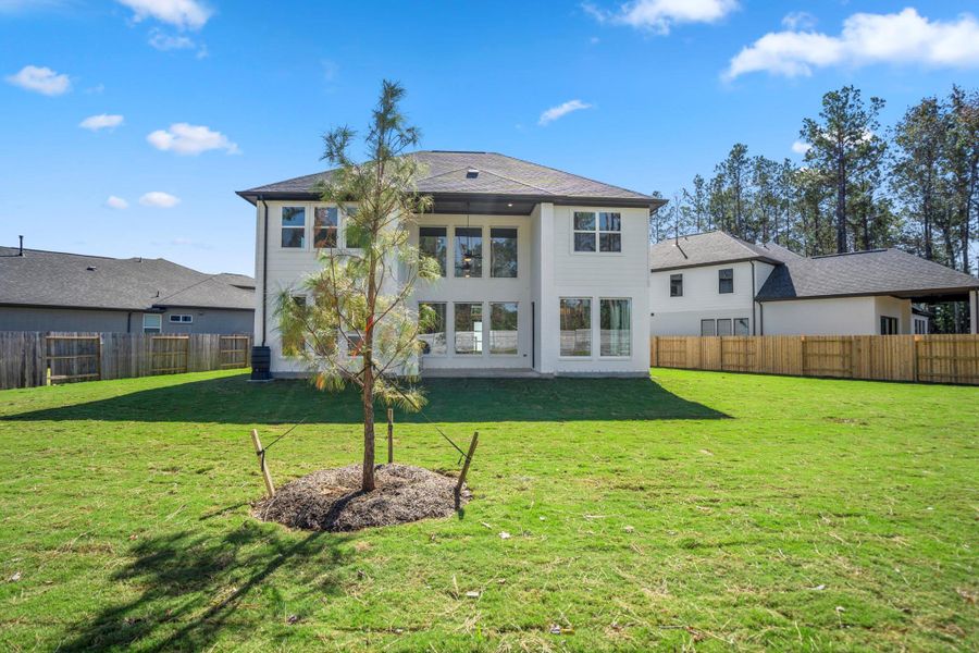Exterior details and patio area of a home in ARTAVIA 55' Lots, Conroe (Image 4). Exterior details and patio area of a home in ARTAVIA 55' Lots, Conroe (Image 4).