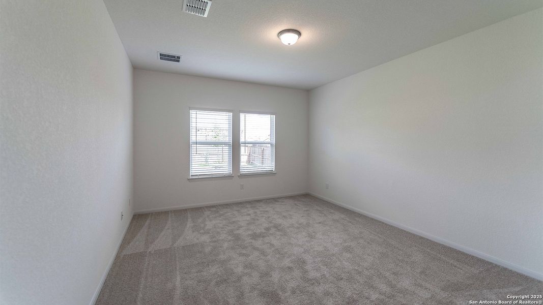 Spacious, unfurnished interior of a new home in Hunter's Ranch, San Antonio (Image 9).