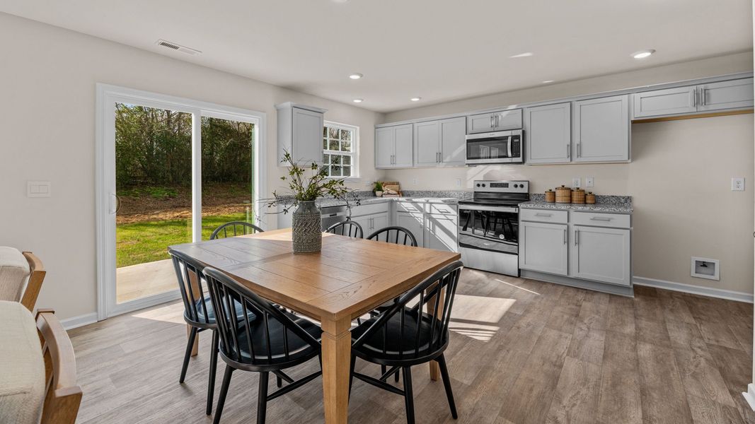 Representative furnished interior of a home built from the TAYLOR by D.R. Horton in Owens Ridge, Lexington (Image 6).
