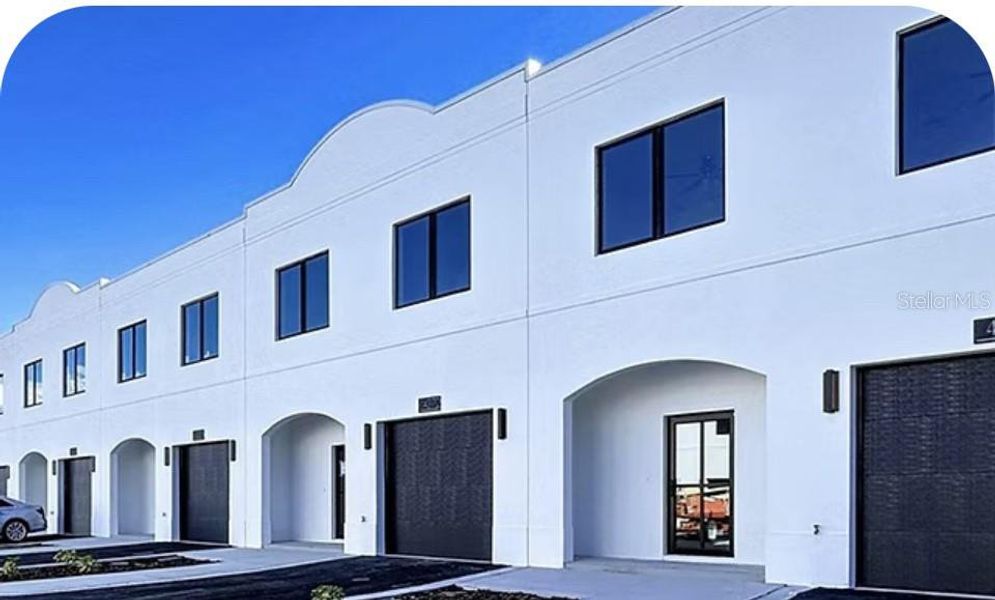 Front exterior of a new home in , Tampa, FL, highlighting curb appeal (Image 1). Front exterior of a new home in , Tampa, FL, highlighting curb appeal (Image 1).