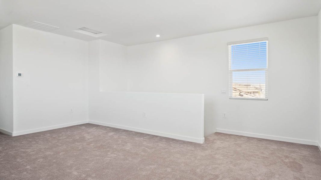 Spacious, unfurnished interior of a new home in Radiance at Superstition Vistas, Apache Junction (Image 25).