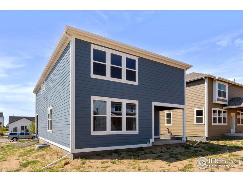 Front exterior of a new home in Bloom, Fort Collins, CO, highlighting curb appeal (Image 2).