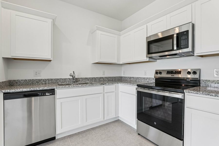 Furnished interior in a model home at Aster Towns in Summerville (Image 11).
