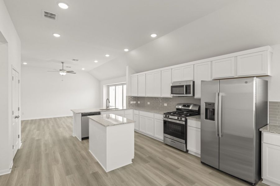 Furnished interior view inside a new home in Village at Three Oaks, Seguin (Image 8).