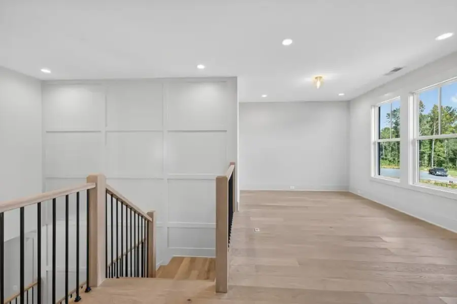 Spacious, unfurnished interior of a new home in The Manors, Jefferson (Image 31).