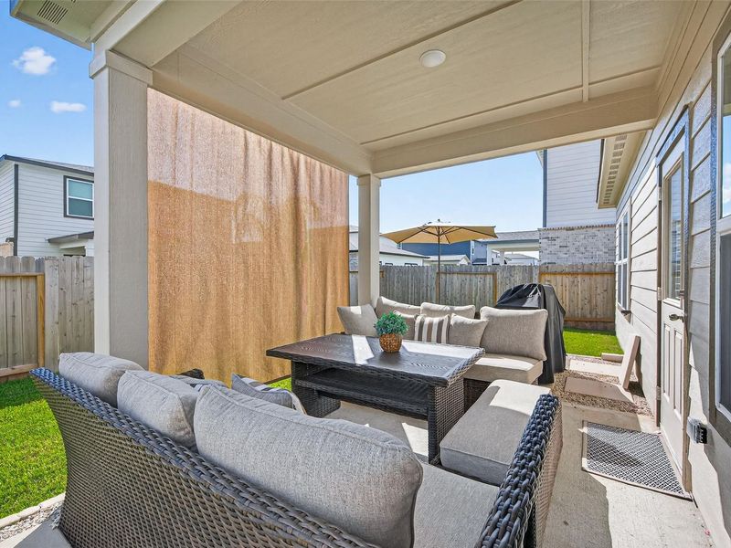 Exterior details and patio area of a home in Lakes at Black Oak, Magnolia (Image 3). Exterior details and patio area of a home in Lakes at Black Oak, Magnolia (Image 3).