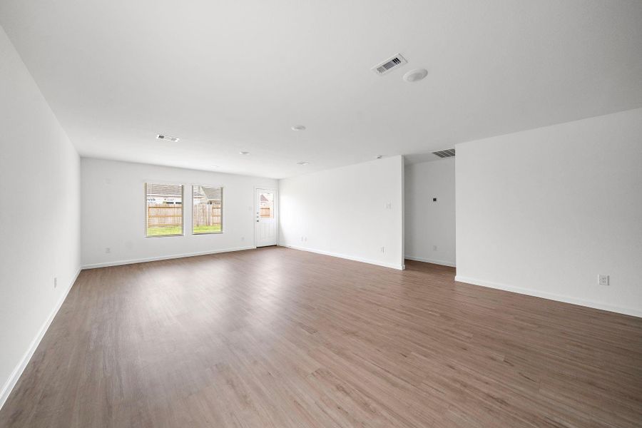 Living area with hall to primary bedroom