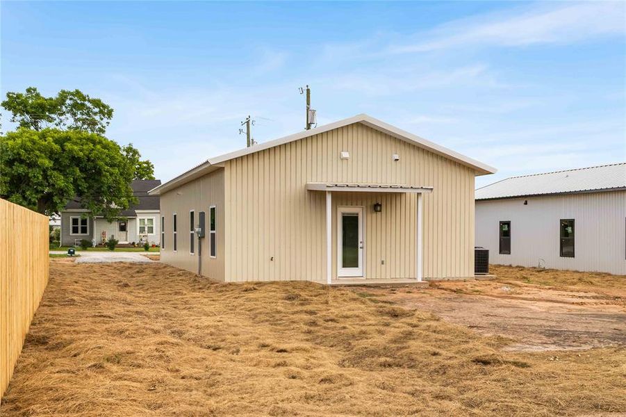 Back of property featuring central AC unit Back of property featuring central AC unit