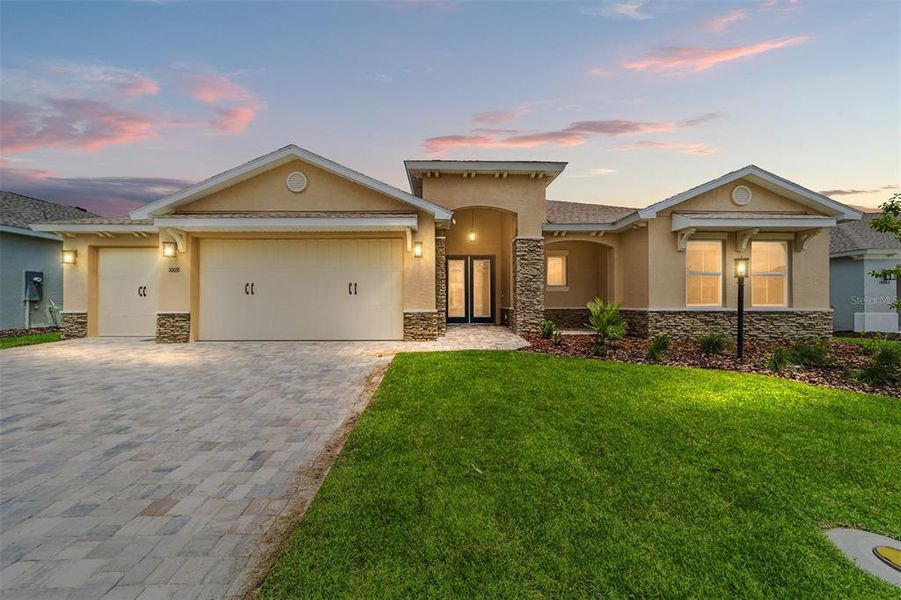 Front exterior of a new home in On Top of the World Communities, Ocala, FL, highlighting curb appeal (Image 23).