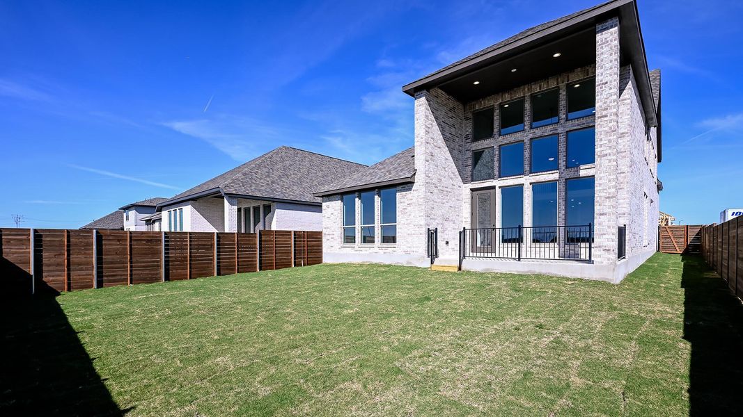 Exterior details and patio area of a home in Juniper Springs, Lockhart (Image 4).