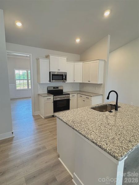 Furnished interior view inside a new home in Kerns Ridge, Salisbury (Image 7).