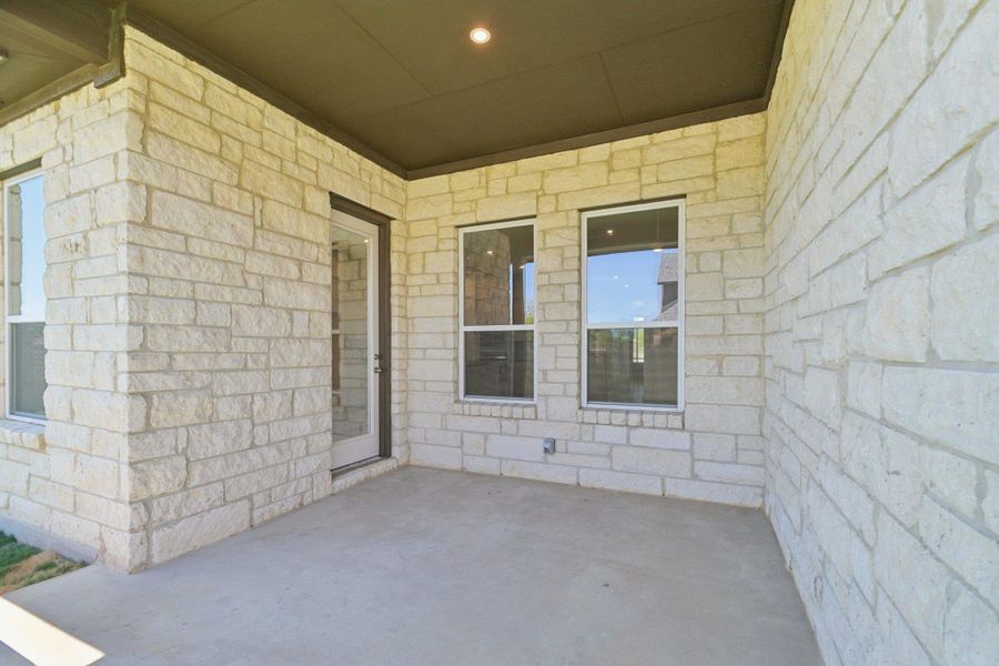 Exterior details and patio area of a home in Persimmon, Buda (Image 4).