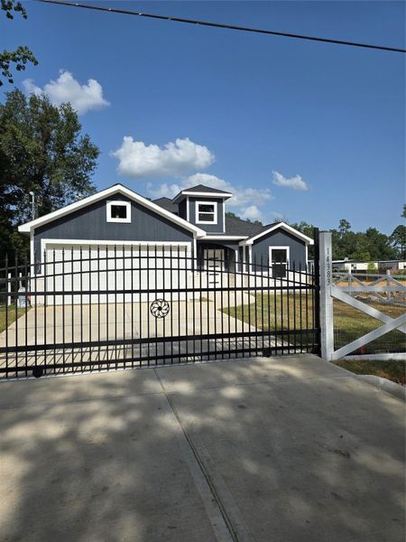 Front exterior of a new home in , Splendora, TX, highlighting curb appeal (Image 15).