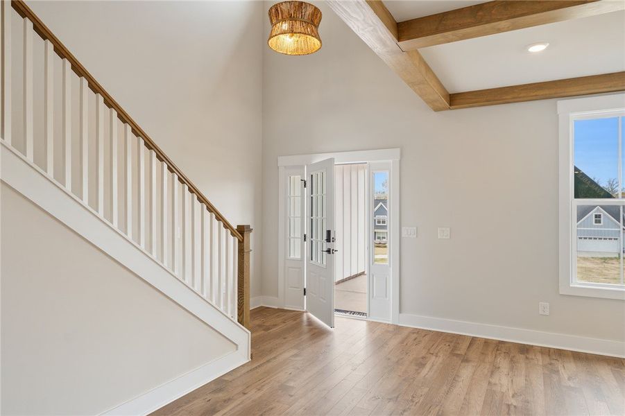 This inviting entry features durable flooring, an