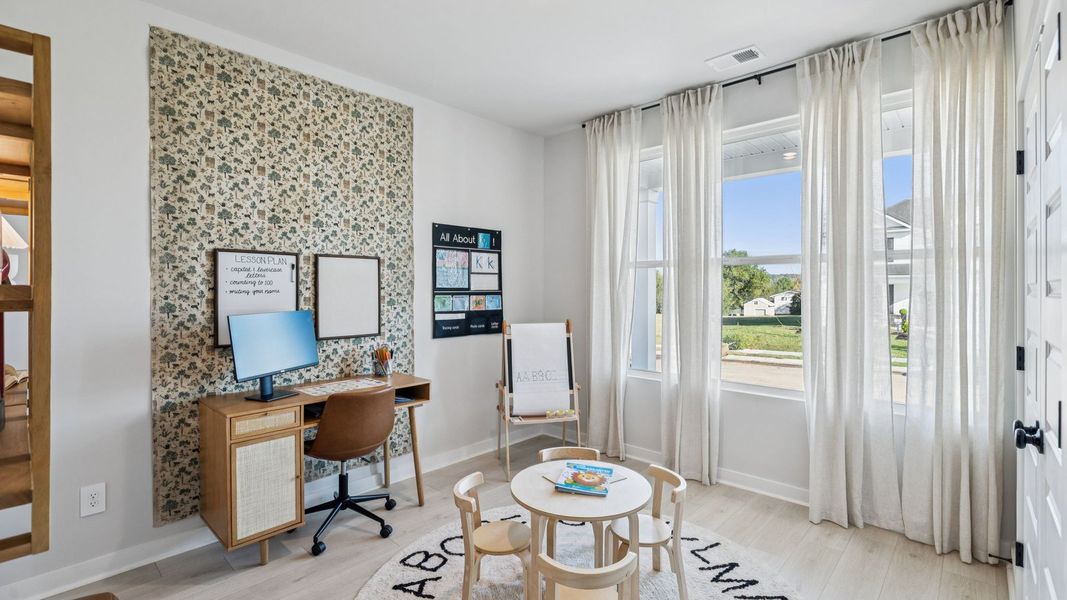 Representative furnished interior of a home built from the CLIFTON by D.R. Horton in Nexus South, Gallatin (Image 5).