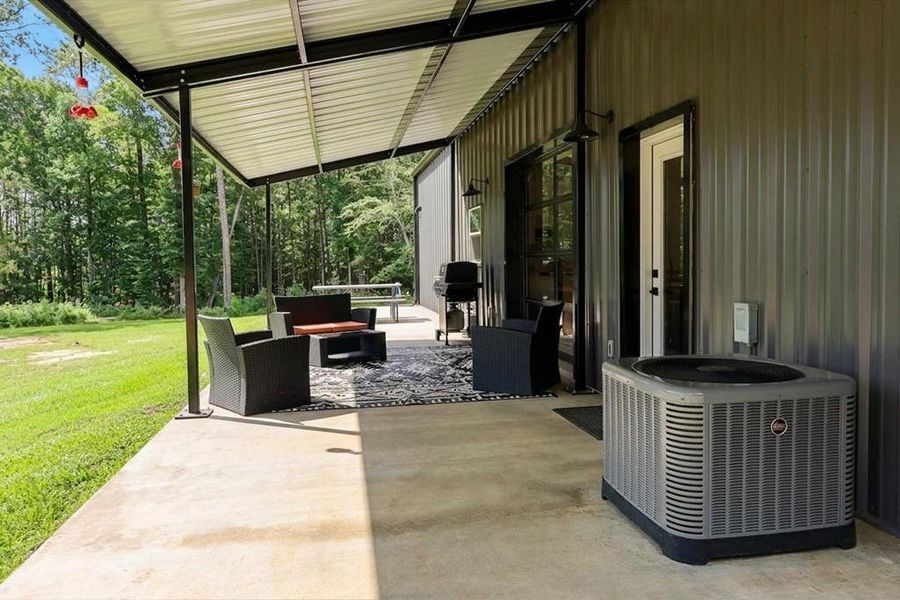 Exterior details and patio area of a home in , Woodville (Image 20).