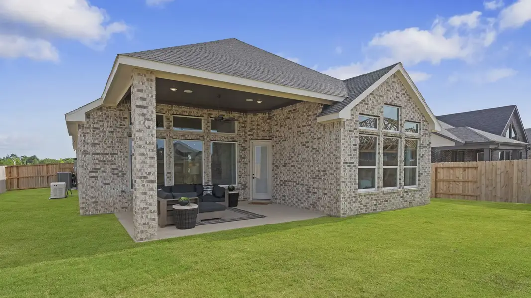 Exterior details and patio area of a home in Elyson 50's, Katy (Image 3).