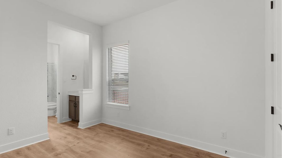 Representative unfurnished interior of a home built from the Drios by Chesmar Homes in Berry Creek Highlands, Georgetown (Image 18).