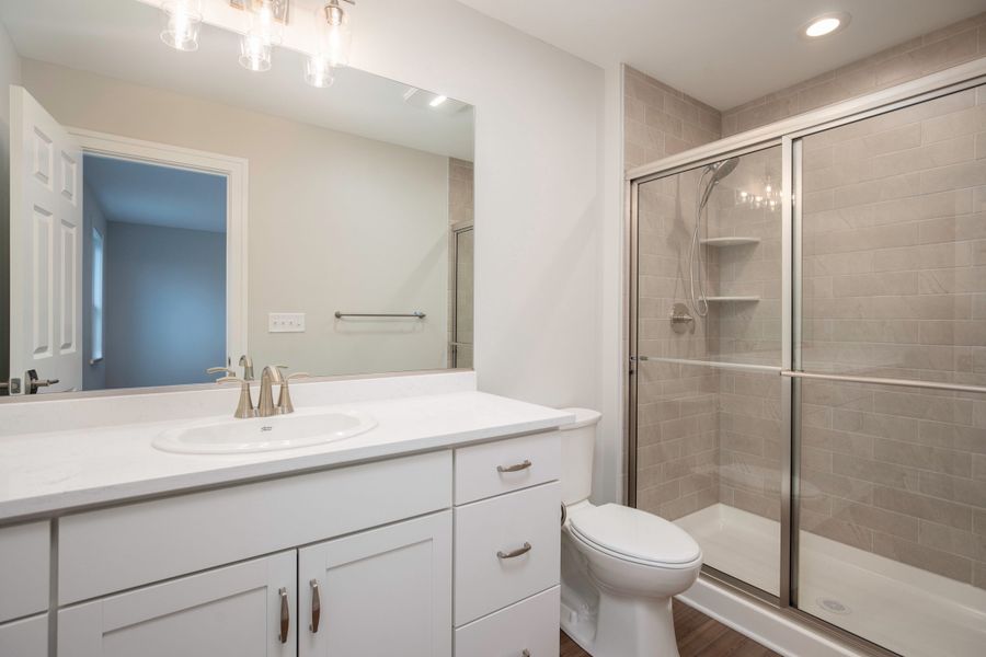 Representative furnished interior of a home built from the The Bailey by Forbes Capretto Homes in Wheatfield Crossing, North Tonawanda (Image 9).
