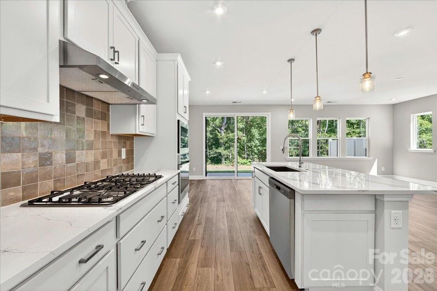 Light filled kitchen with ample storage Light filled kitchen with ample storage