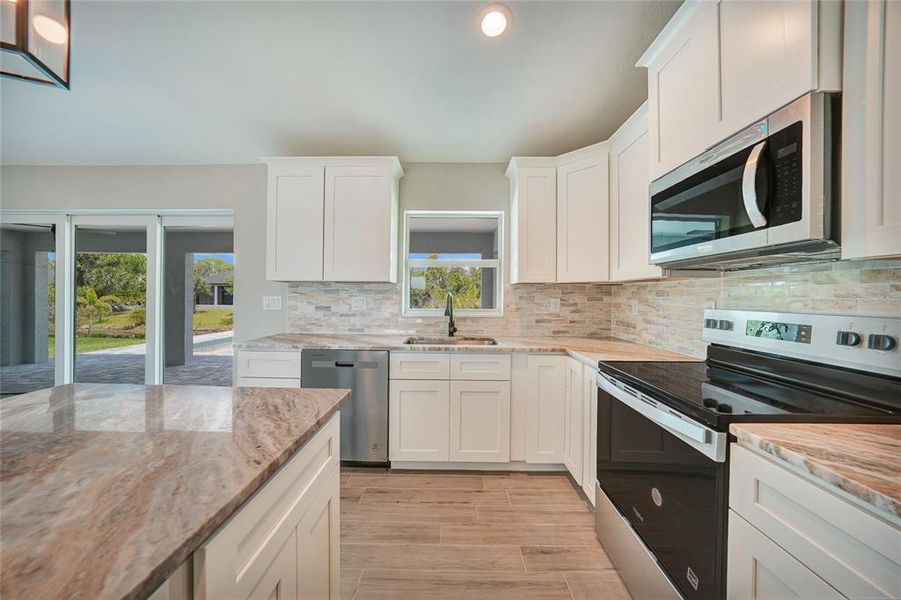 Furnished interior view inside a new home in , Port Charlotte (Image 12). Furnished interior view inside a new home in , Port Charlotte (Image 12).