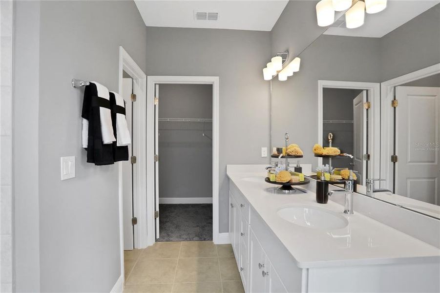 Furnished interior view inside a new home in Serenade at Ovation, Winter Garden (Image 26).