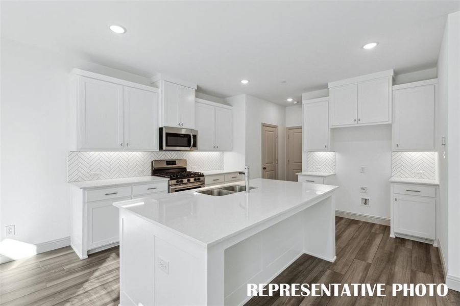 You'll find fantastic style, storage and prep space in this dream kitchen!  REPRESENTATIVE PHOTO