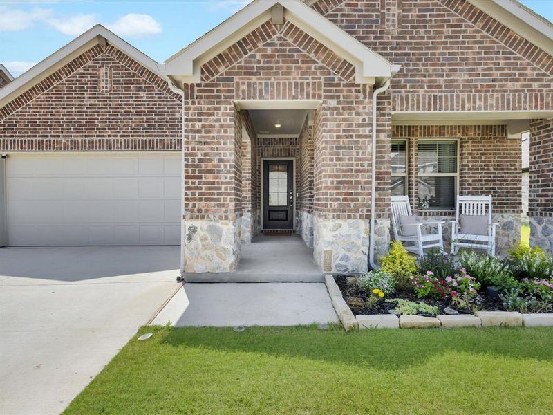 Front exterior of a new home in Tesoro at Chisholm Trail Ranch, Crowley, TX, highlighting curb appeal (Image 18).