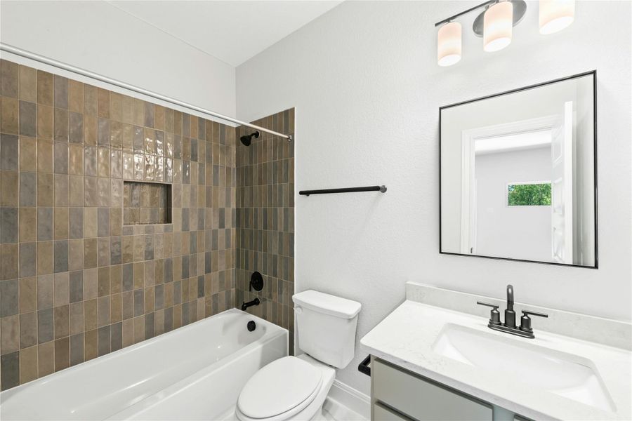 Bathroom featuring shower combination and vanity Bathroom featuring shower combination and vanity