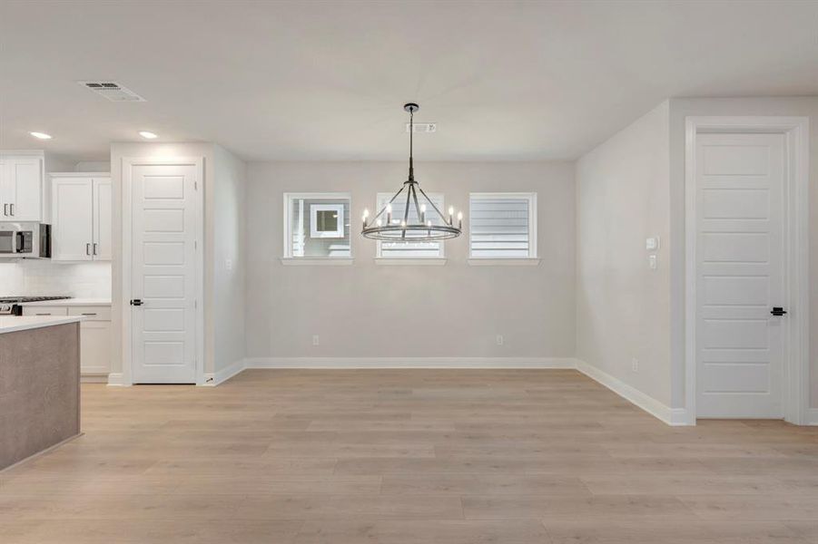 Spacious, unfurnished interior of a new home in Painted Tree Woodland West – Cottages, McKinney (Image 17).