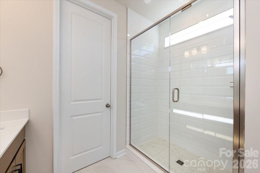 Primary Bathroom with Tiled Shower Walls and Floor Pan Primary Bathroom with Tiled Shower Walls and Floor Pan